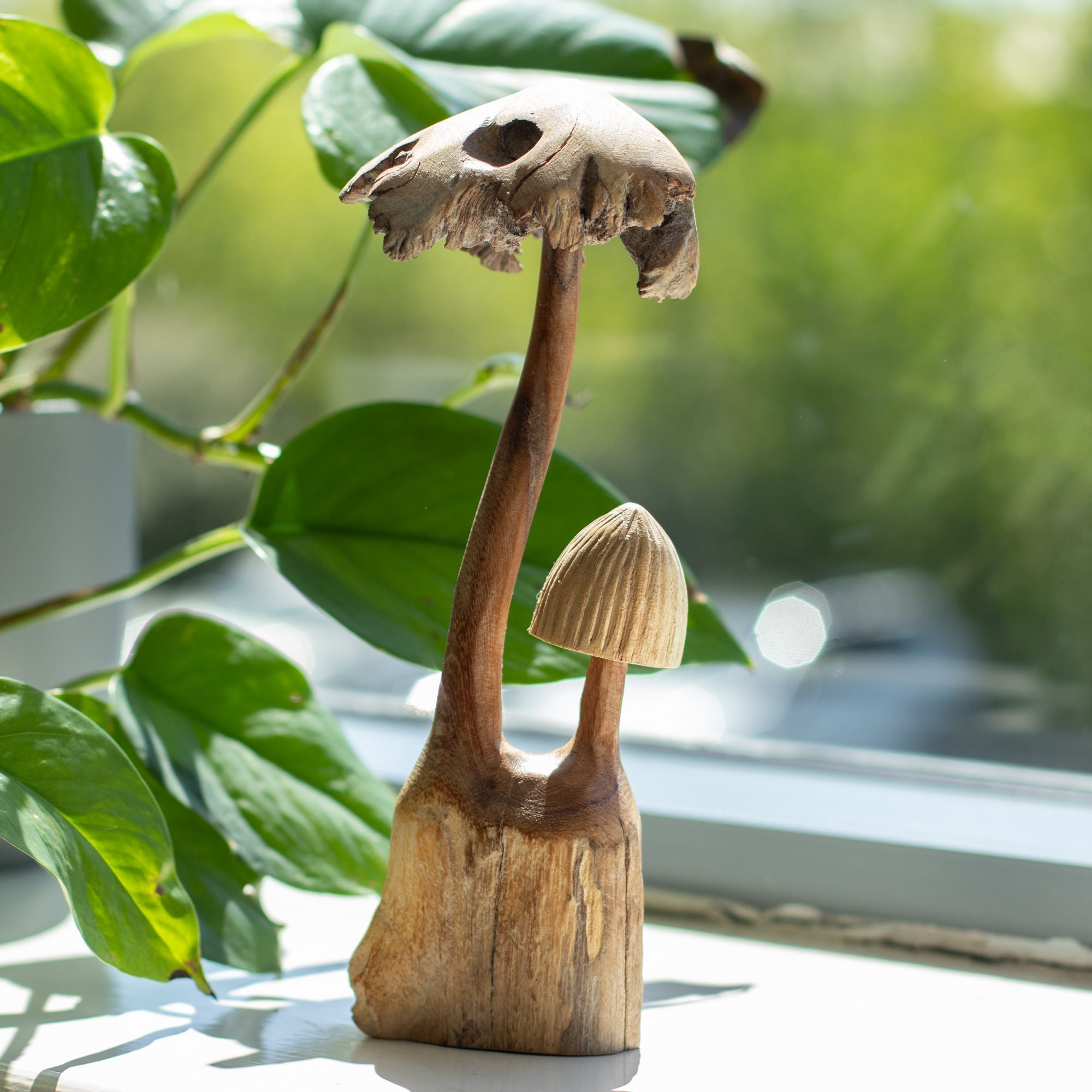 Sculpture artisanale en bois parasite