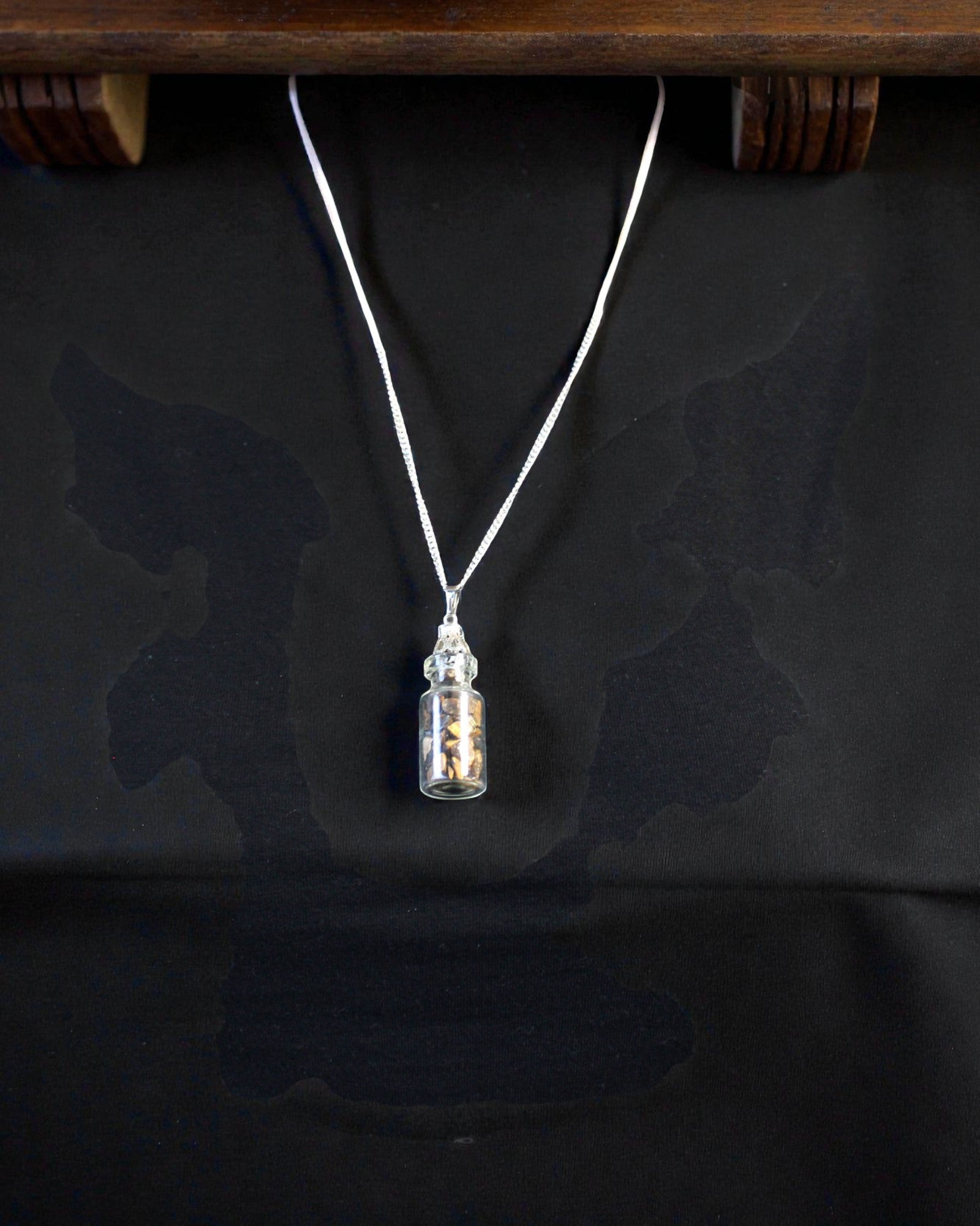 Bottle of Power – Necklace with Tiger's Eye in a Vial