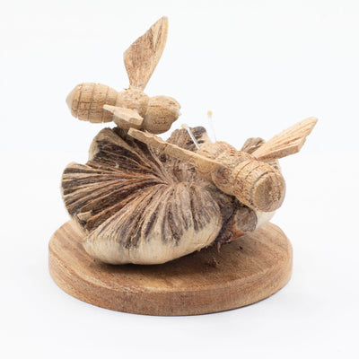 Sculpture artisanale sur excroissance d'arbre