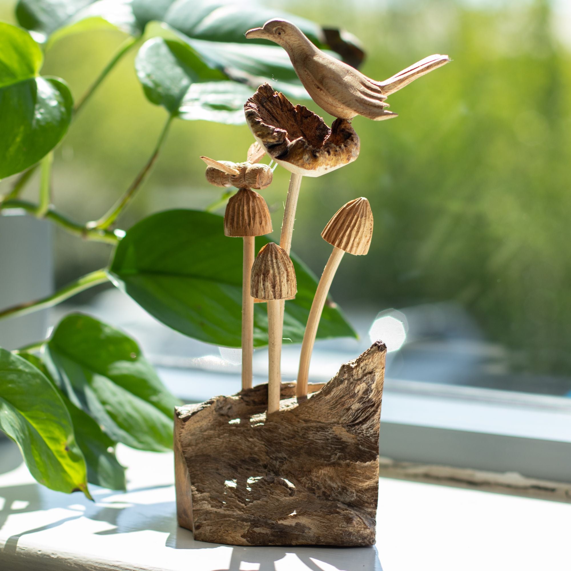 Sculpture en bois parasite