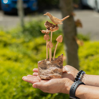 Sculpture en bois parasite