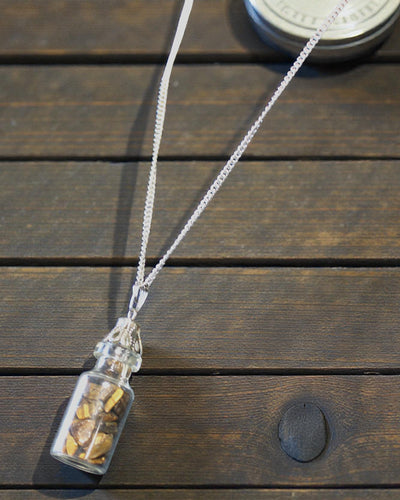 Bottle of Power – Necklace with Tiger's Eye in a Vial