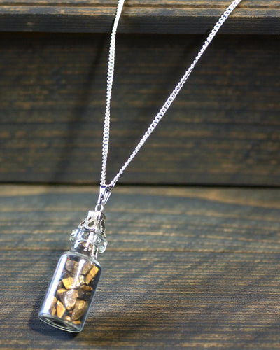 Bottle of Power – Necklace with Tiger's Eye in a Vial