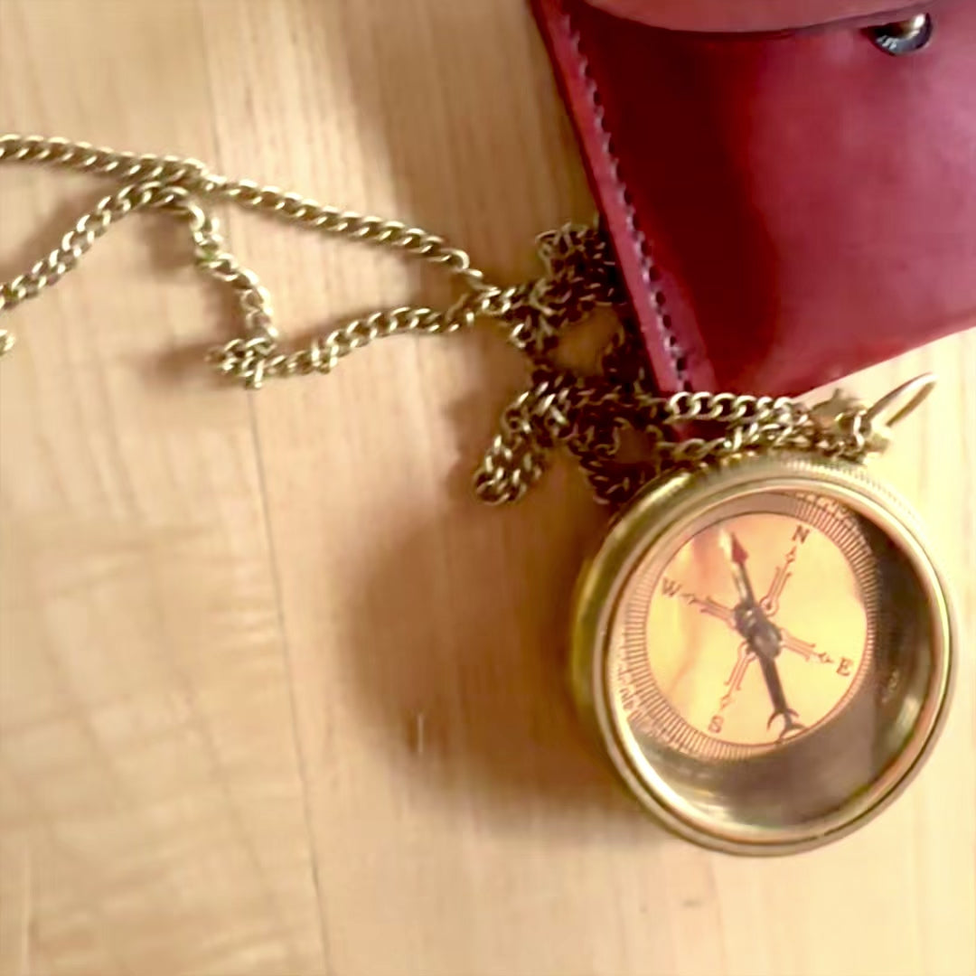 Brass compass on a chain in a leather case with customizable engraving